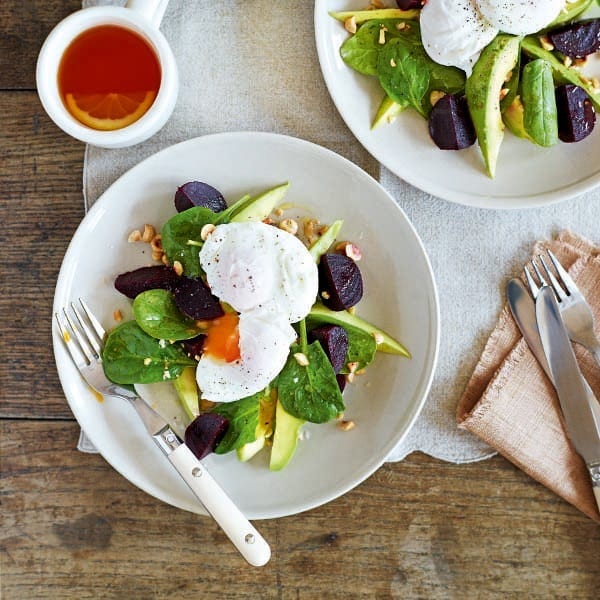 Poached eggs with avocado, beetroot and spinach