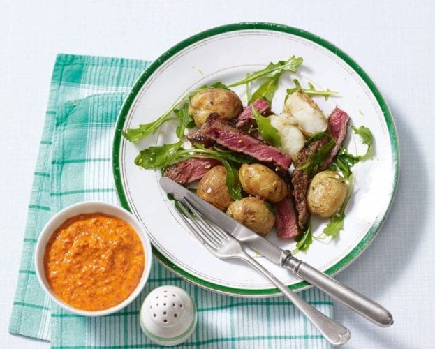 Seared paprika beef salad with smoky romesco sauce