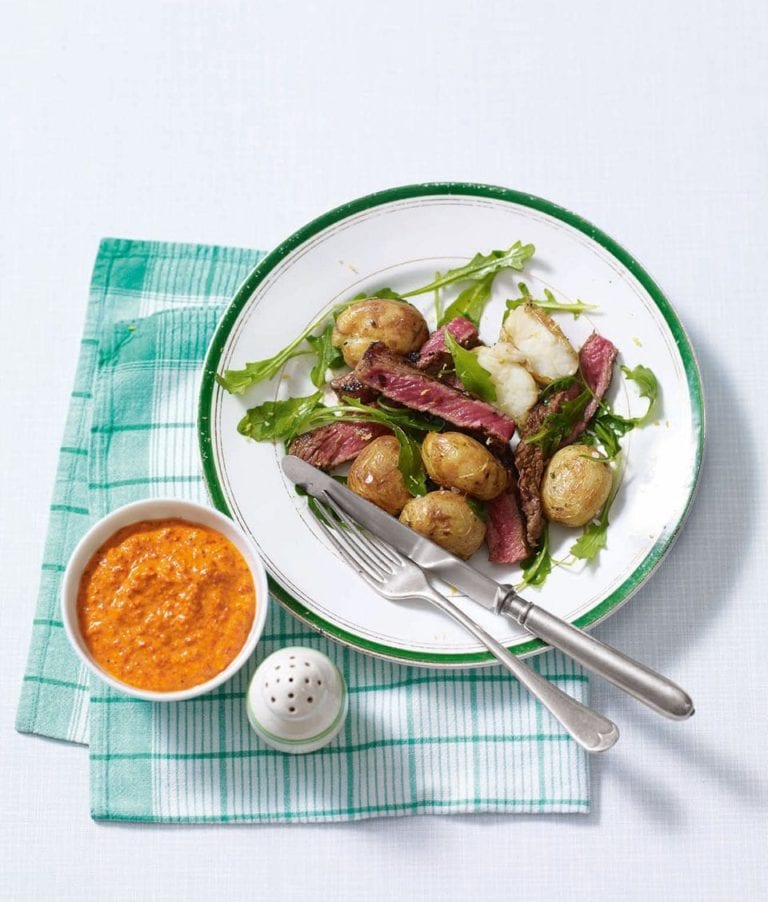 Seared paprika beef salad with smoky romesco sauce