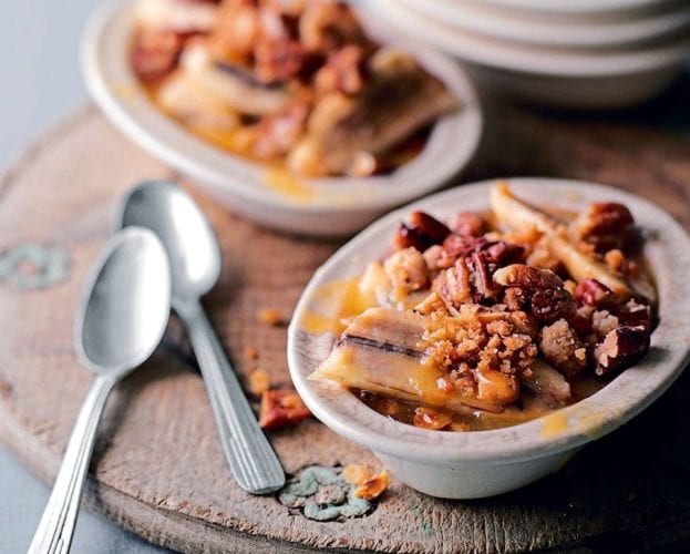 Maple and rum baked bananas with toasted hazelnuts and pistachios
