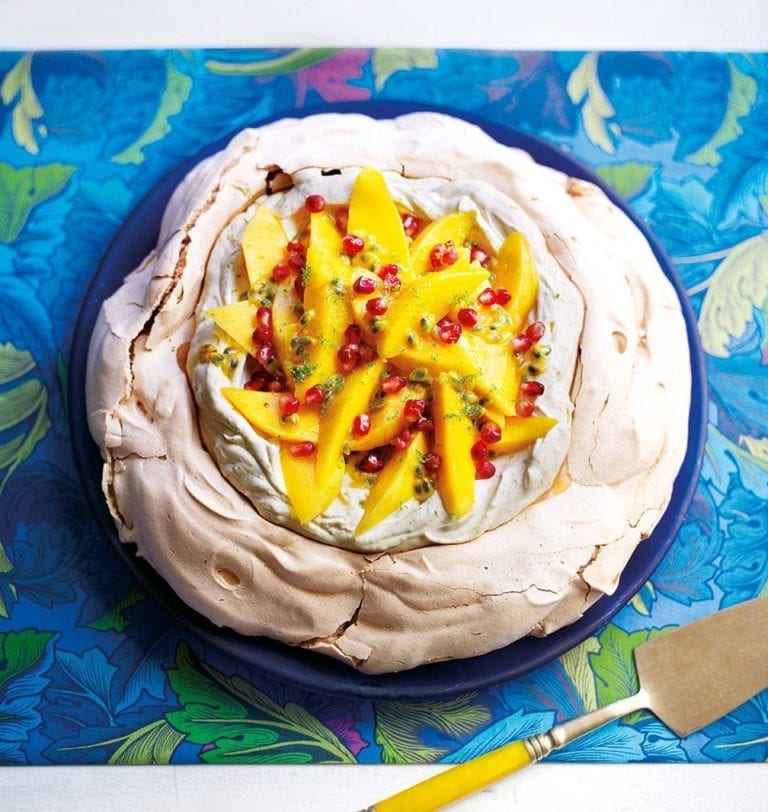 Pavlova with lime cream and tropical fruits