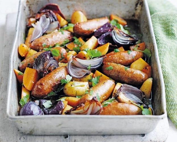 Sausages and potatoes in ale with roasted red onions