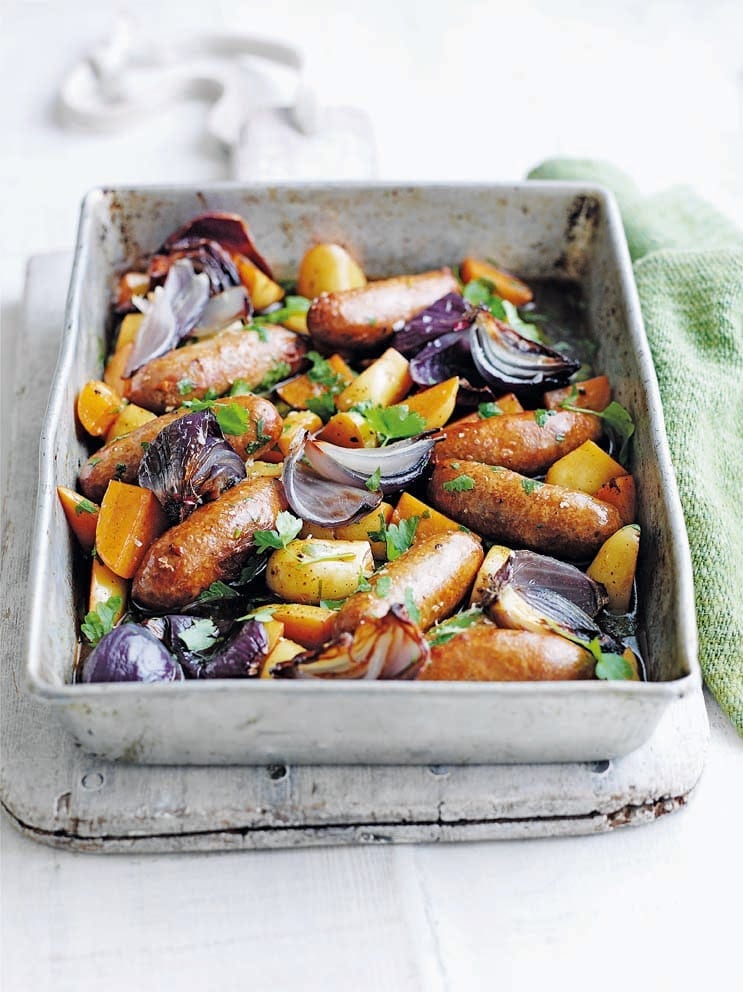 Sausages and potatoes in ale with roasted red onions