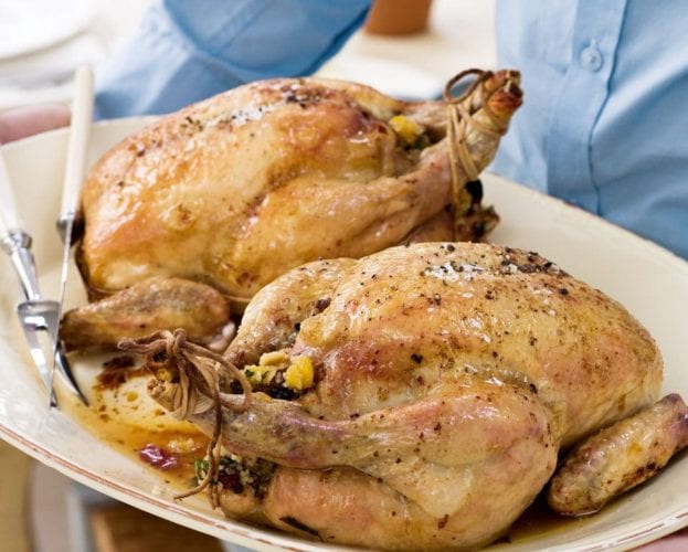 Roast chickens with a fragrant couscous stuffing