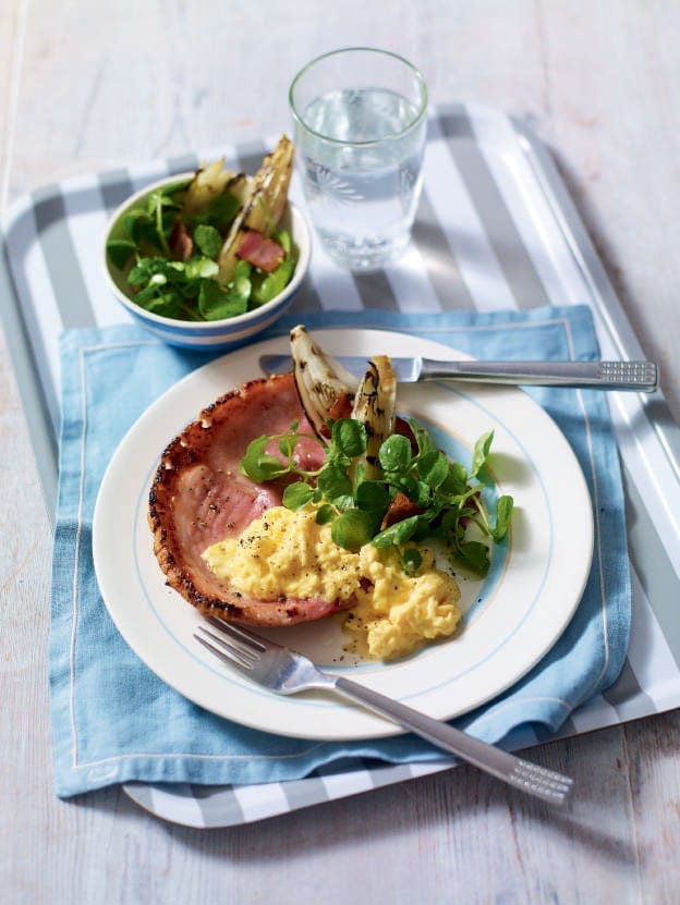 Glazed gammon steaks with scrambled eggs and chicory salad