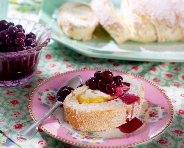 Summer berry pavlova roulade