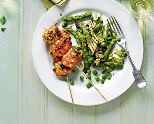 Griddled king prawns with warm salad