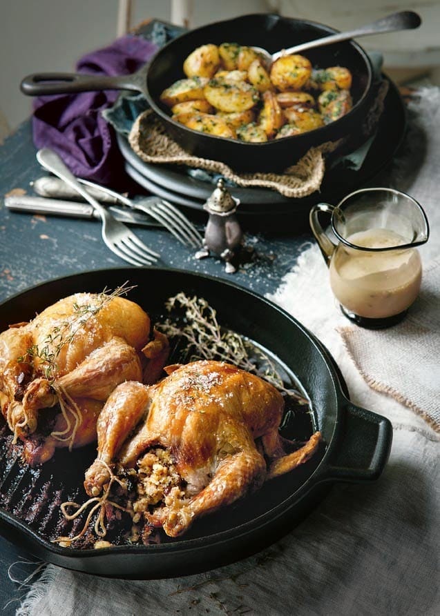 Mushroom and thyme-stuffed poussins with madeira sauce