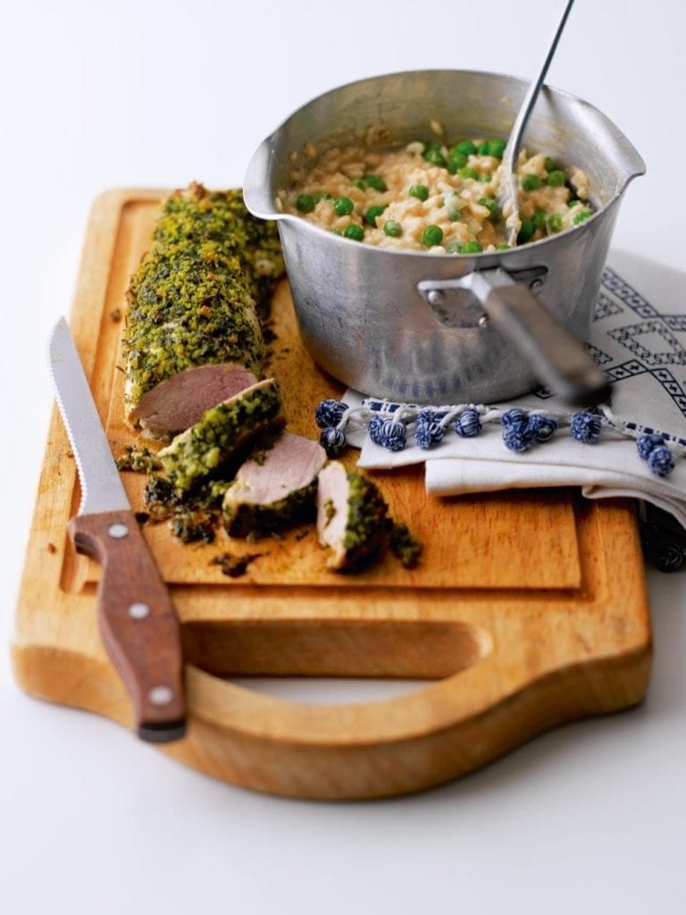 Herby roast pork with pea and ricotta risotto