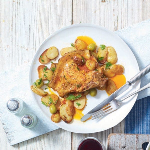 Spanish-style pork chops with new potatoes and olives