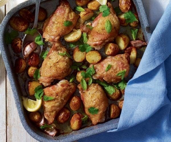 Roast chicken with herbs and new potatoes