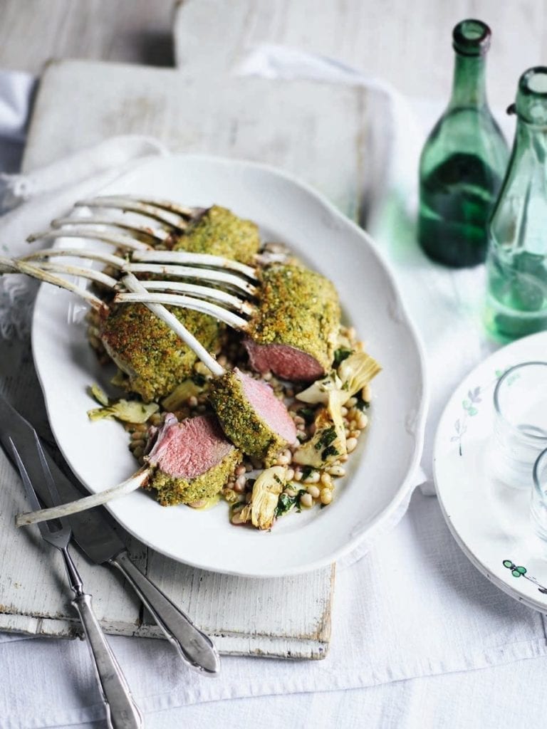 Herb-crusted rack of lamb with beans, artichokes and garlic