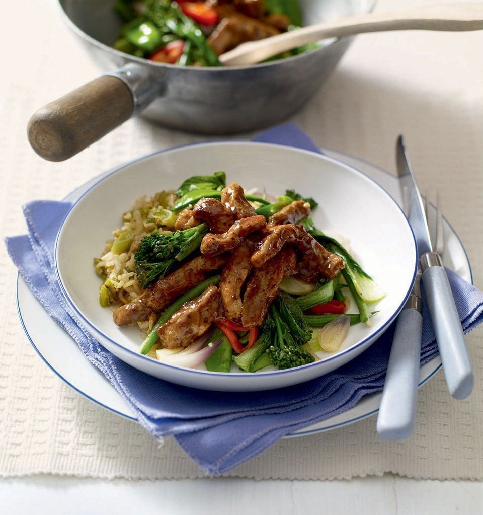 Sticky chilli and black bean pork with egg-fried rice recipe | delicious. magazine