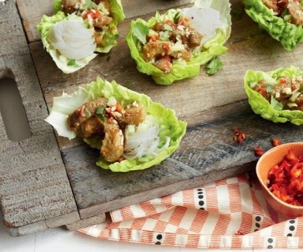 Charred lettuce with boiled eggs, anchovies and parmesan crisps