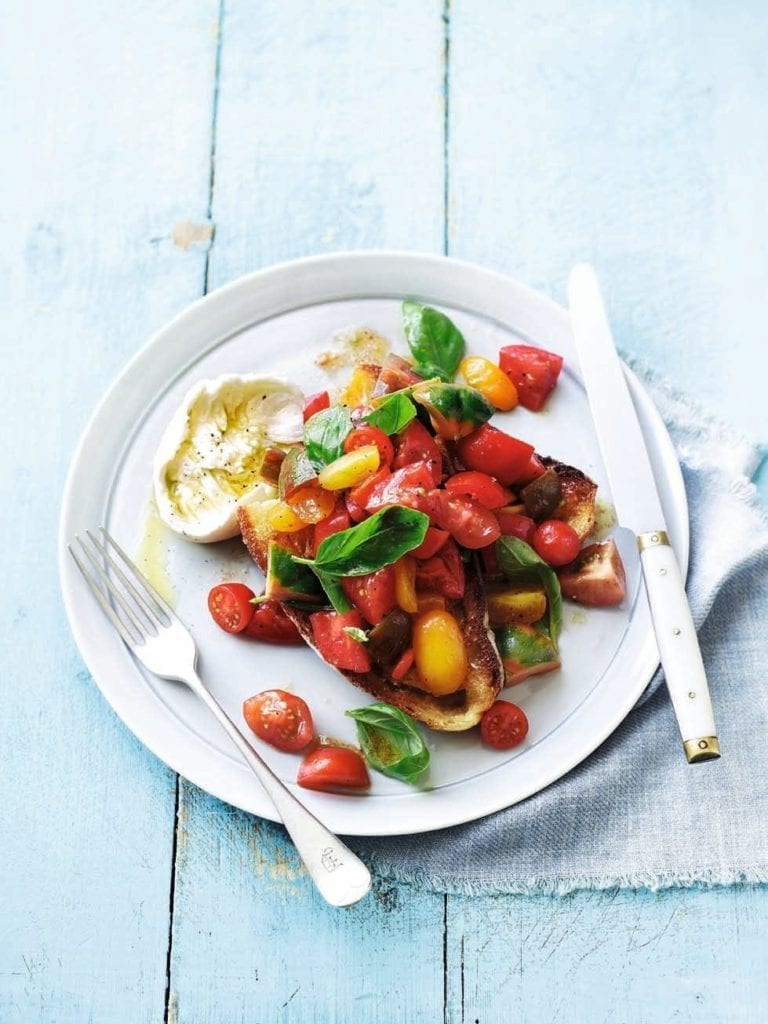 Tomatoes on toast with mozzarella