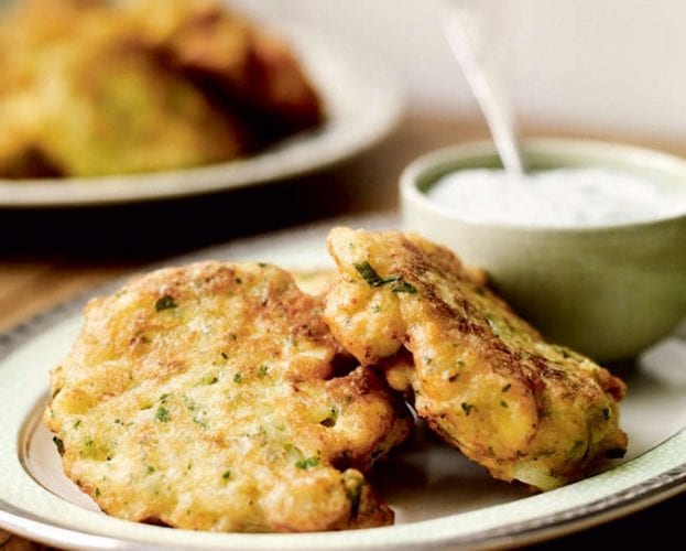 Spiced onion fritters with poached eggs