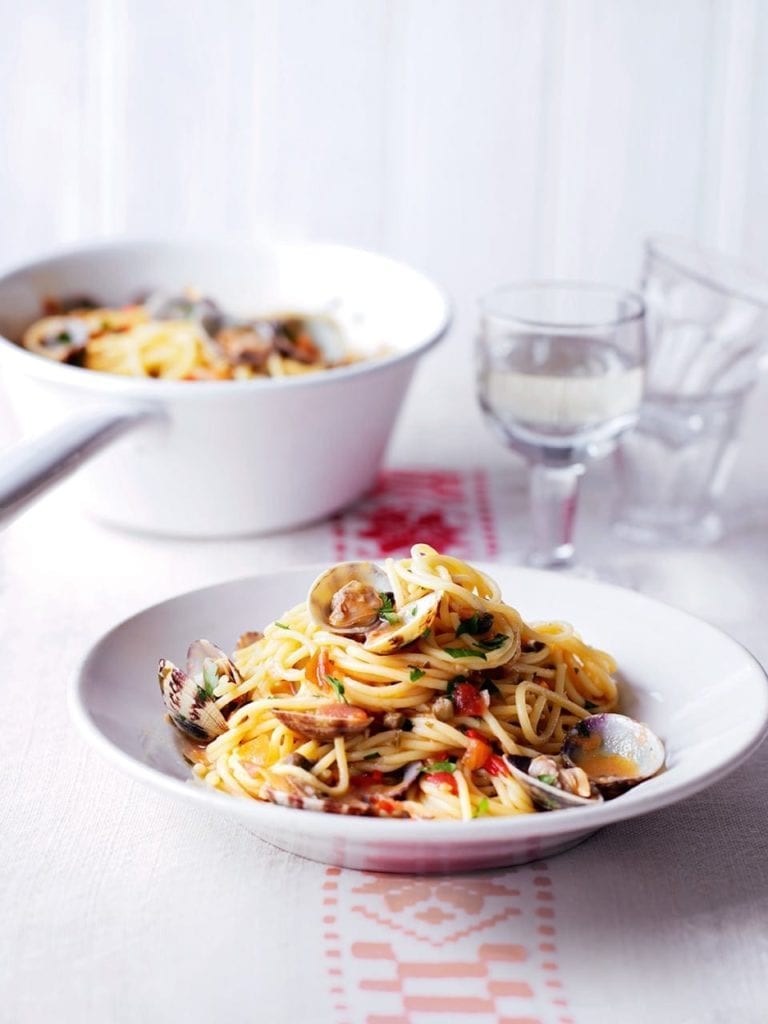Spaghetti vongole on a white plate