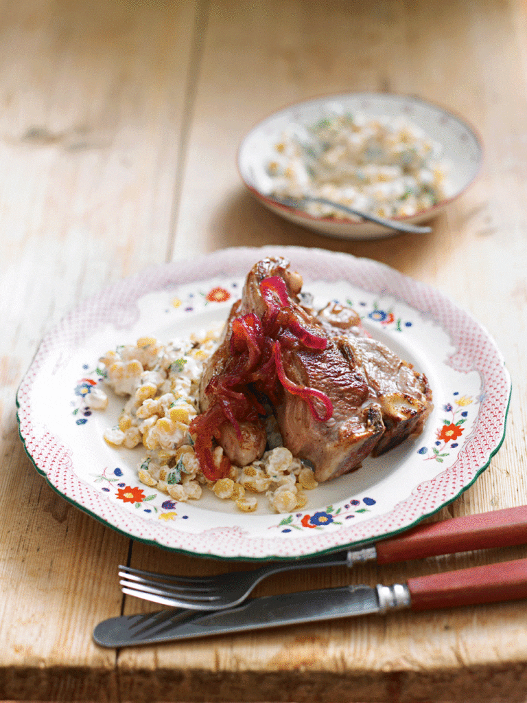 Lamb chops with spiced split peas and caramelised onions