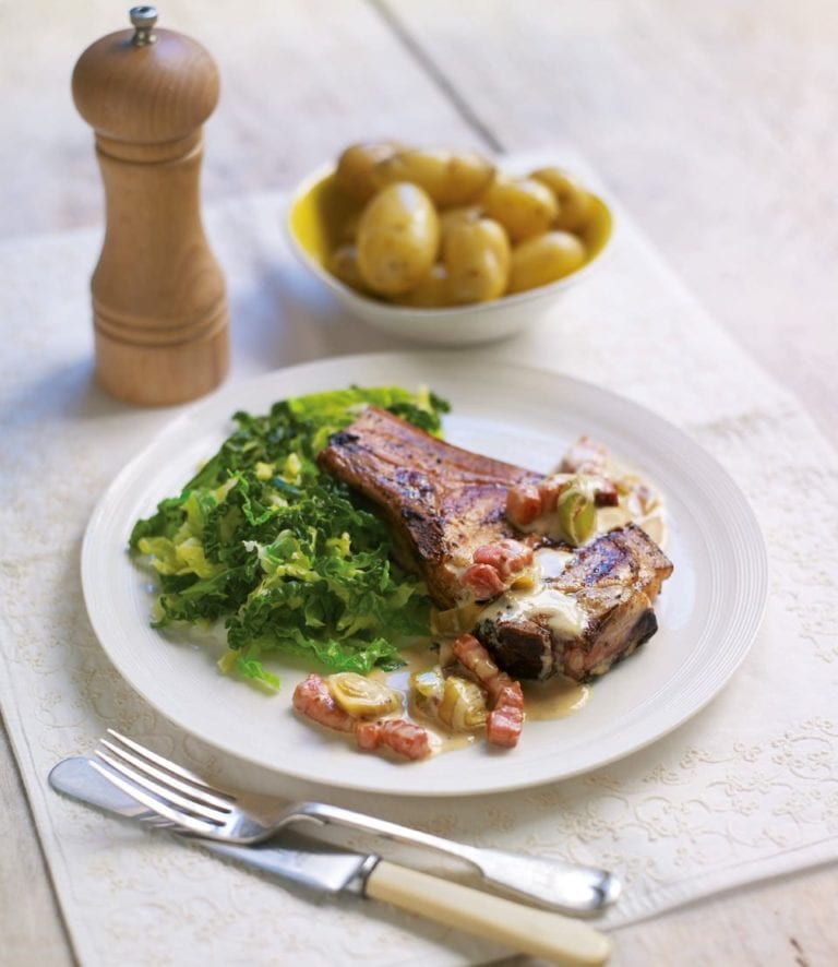 Griddled pork chops with creamy leek and bacon sauce