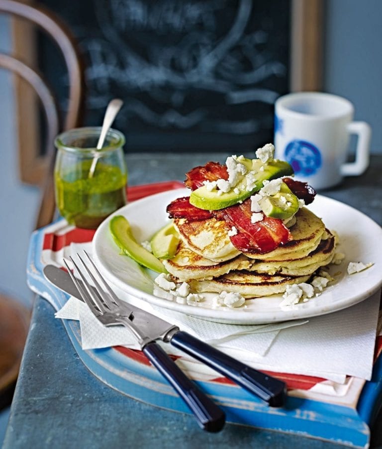 Fluffy American pancakes with bacon and avocado