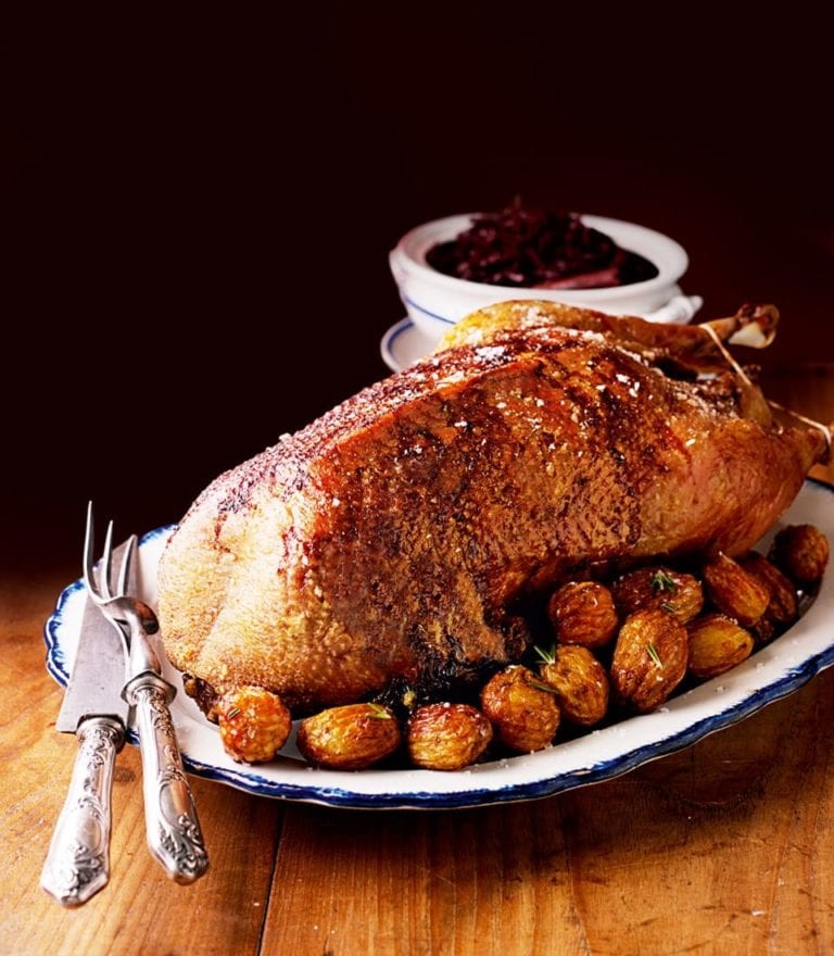 Whole roast goose stuffed with apples and prunes