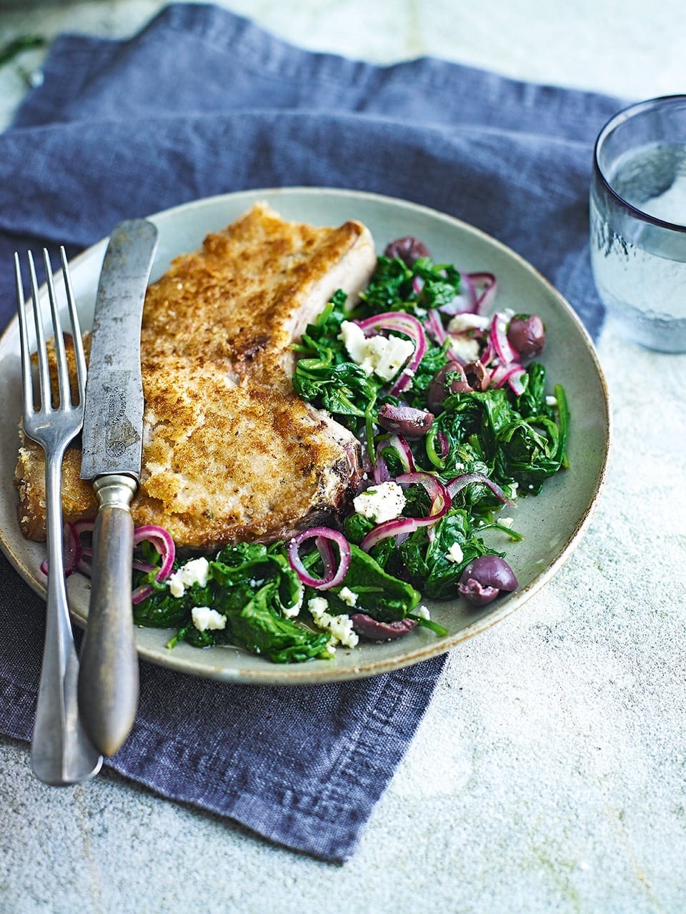 Wilted spinach with crumbed pork cutlets recipe | delicious. magazine