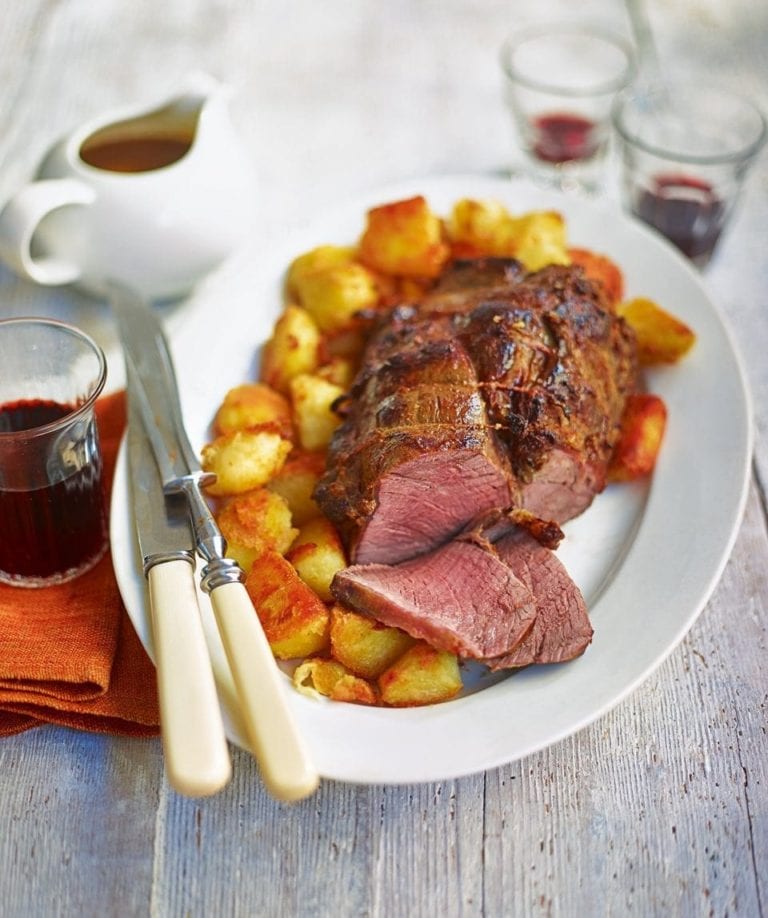 Roast topside of beef with roasties and gravy