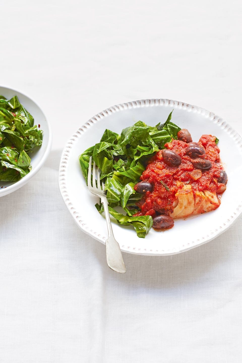 Tomato, olive and rosemary cod with stir-fried greens recipe