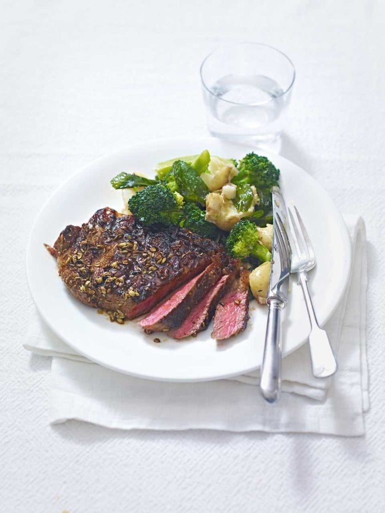 Spiced steak with lemony potatoes and broccoli