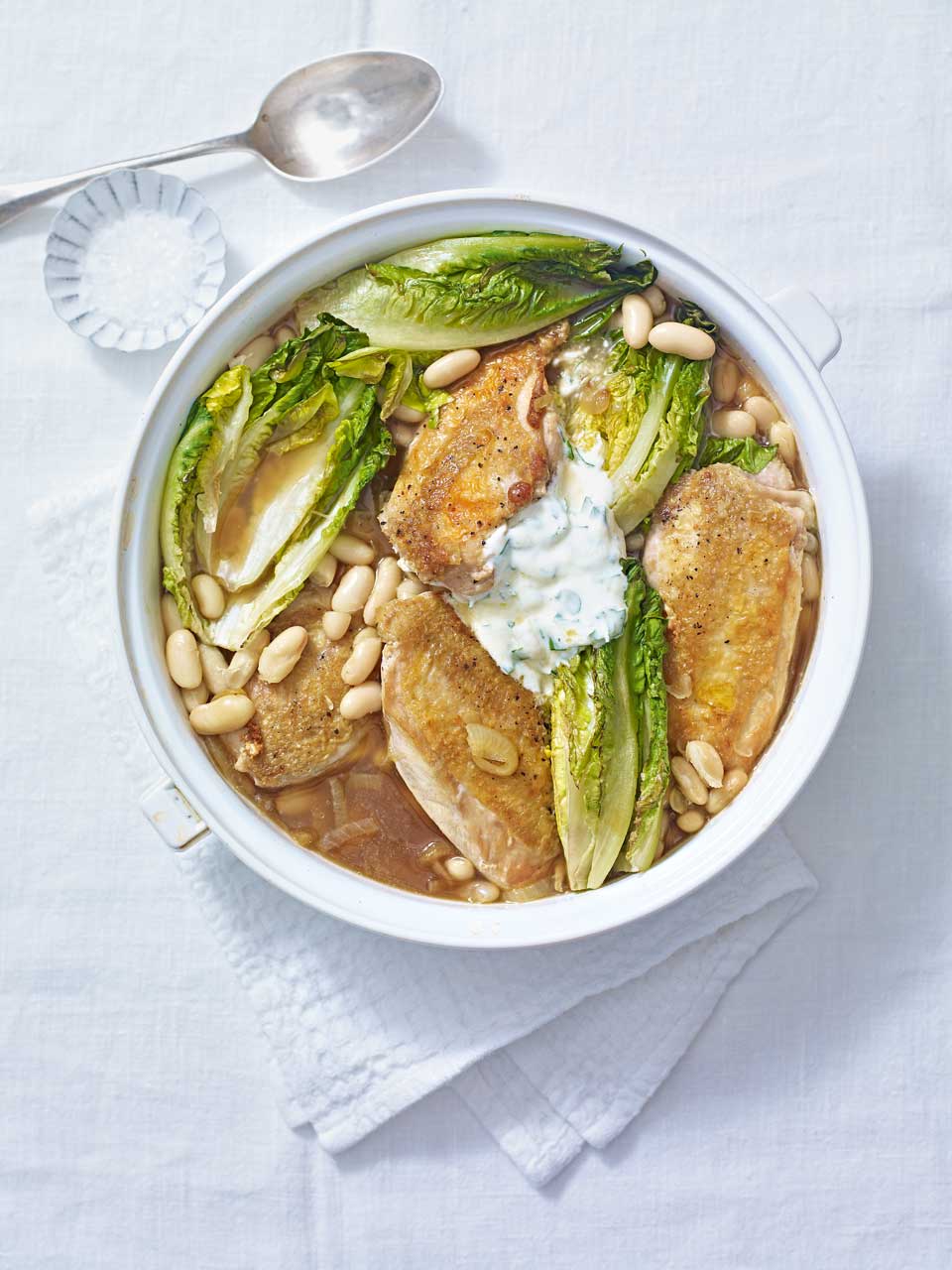 Chicken with beans, braised little gems and garlic yogurt recipe | delicious. magazine