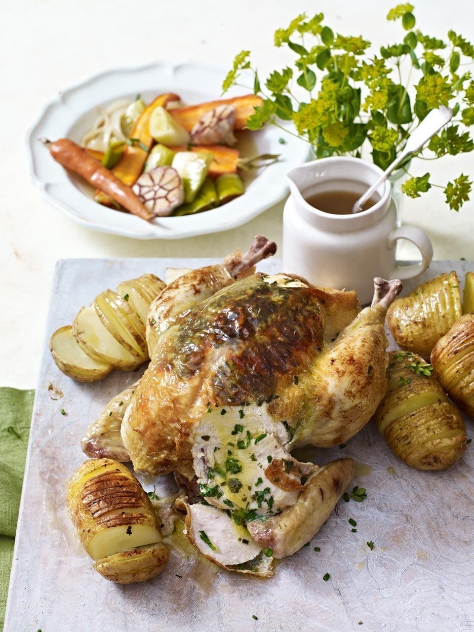 image of Roast Chicken With Spring Vegetables recipe by Delicious Magazine image of Roast Chicken With Spring Vegetables recipe by Delicious Magazine