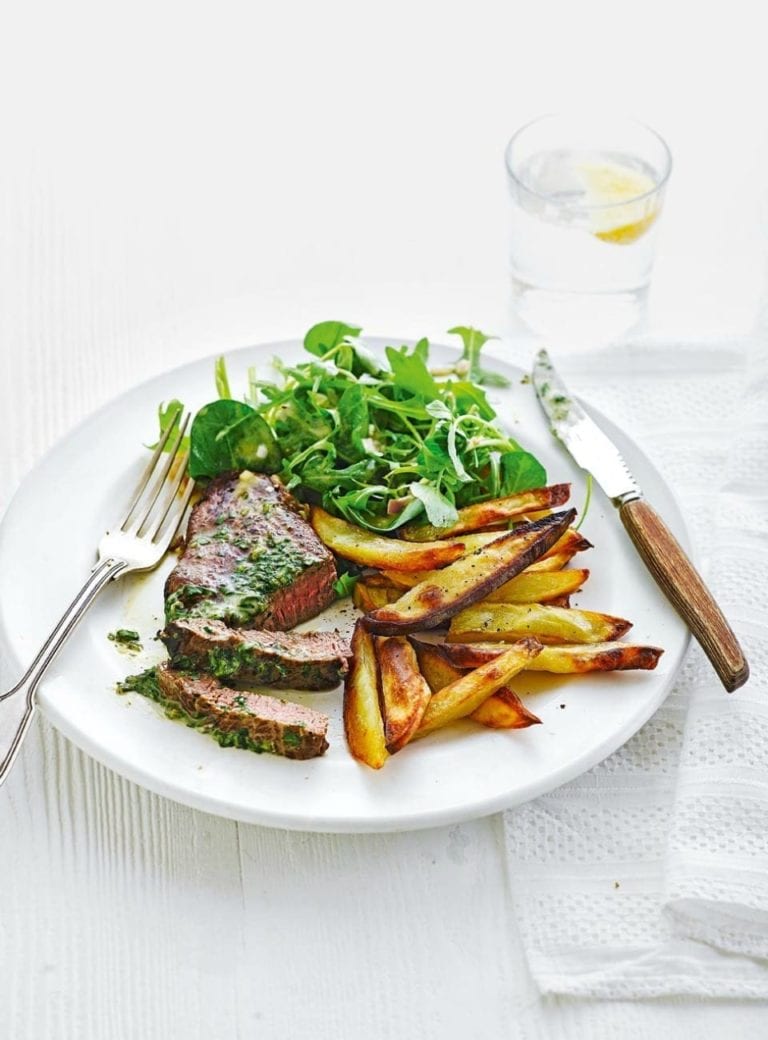 Steak frites (steak and chips) recipe, served on a white plate