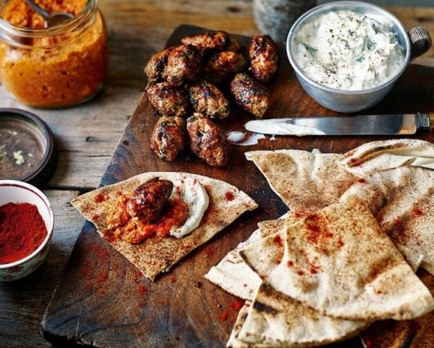 Lamb koftas with romesco and garlic yogurt