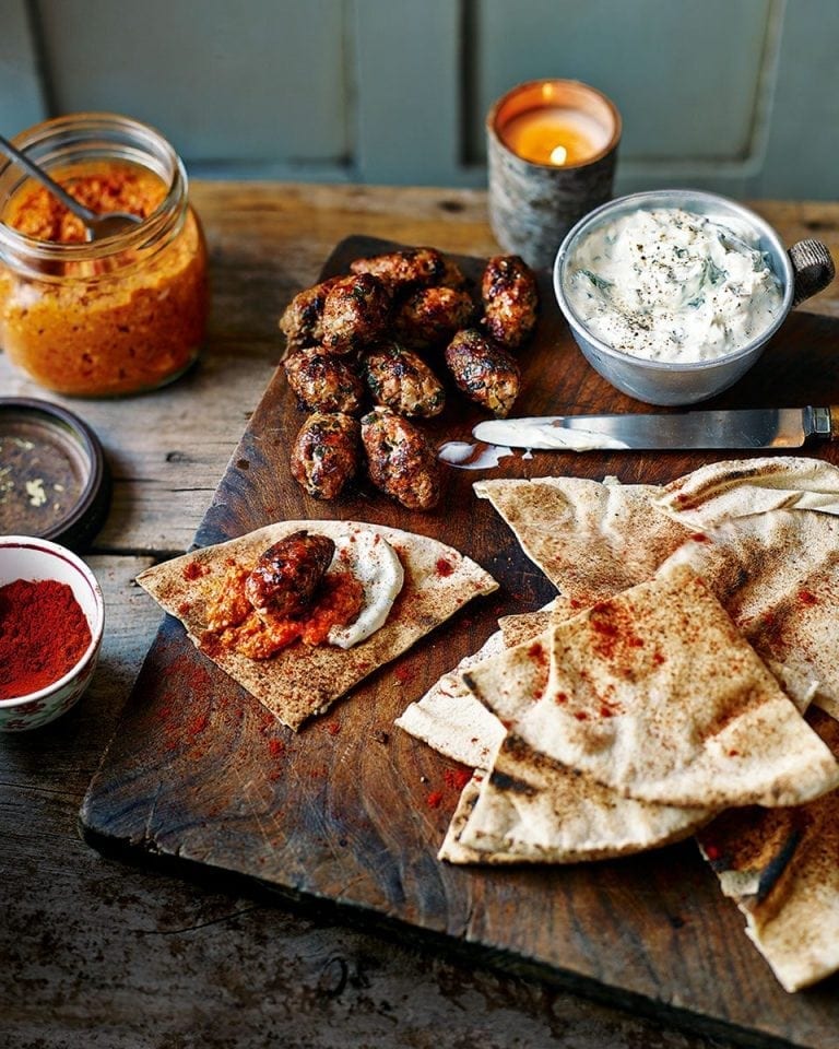 Lamb koftas with romesco and garlic yogurt recipe delicious. magazine