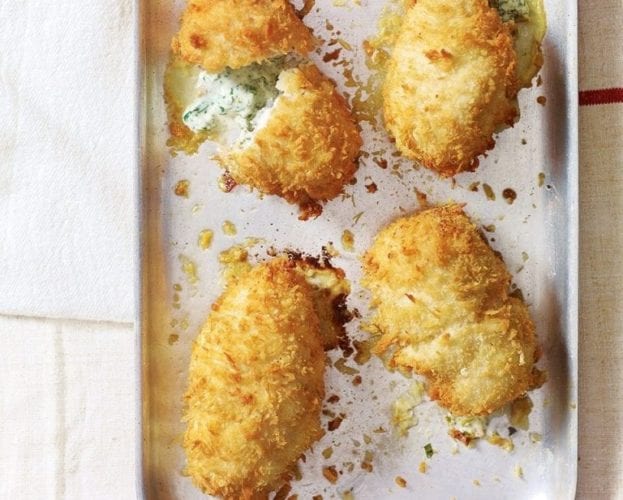 Chicken kievs on a roasting tray