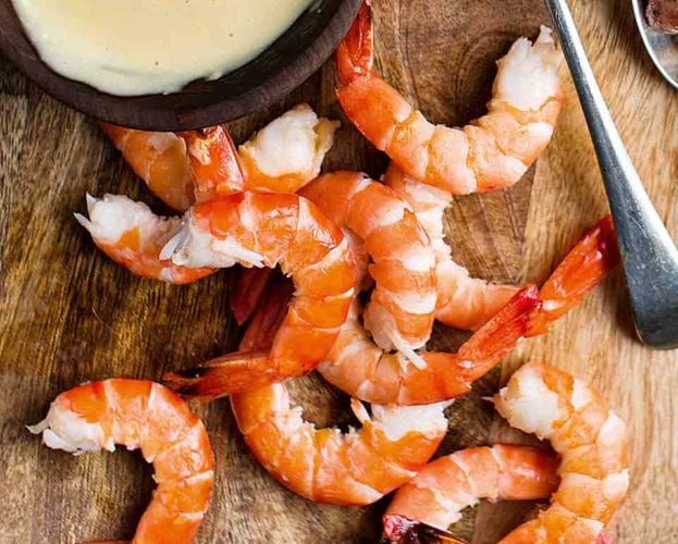 Griddled king prawns with warm salad