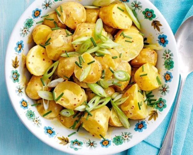 Poached egg and new potato salad with crispy bacon