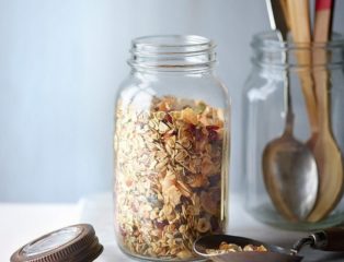 Low-sugar granola in a glass jar