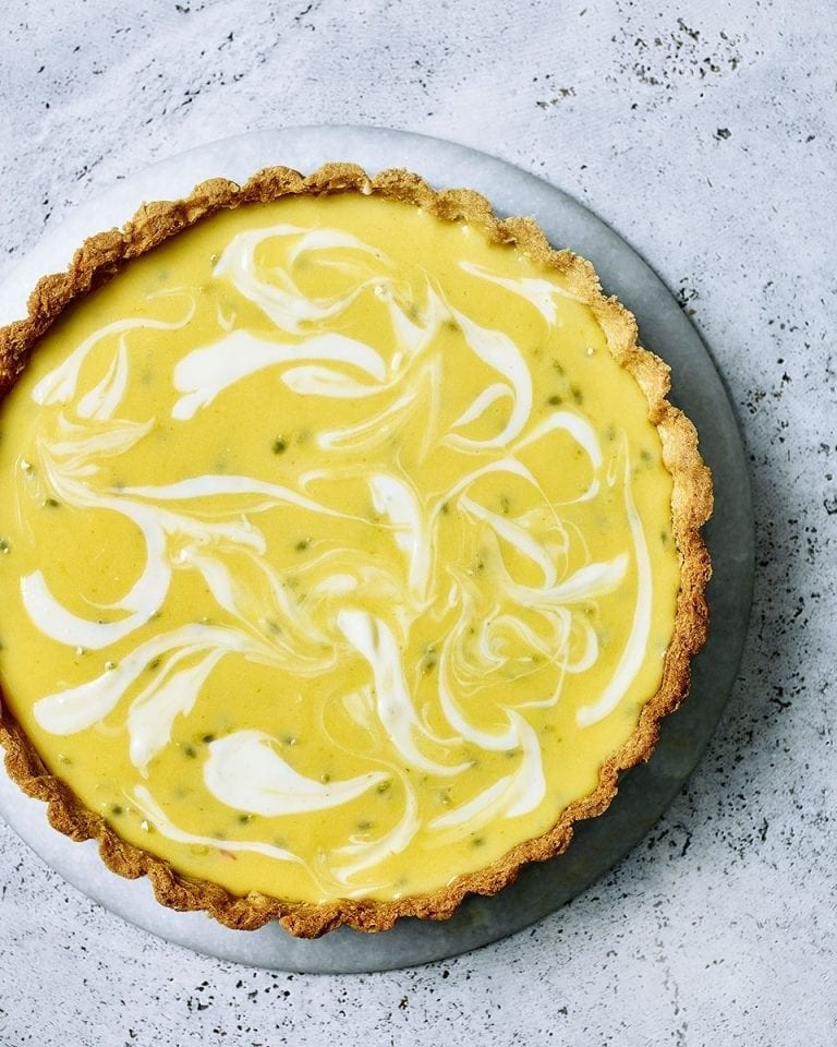 Lemon, lime and passion fruit cheesecake tart