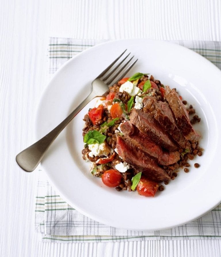 Seared steak with sun-dried tomato and basil puy lentils