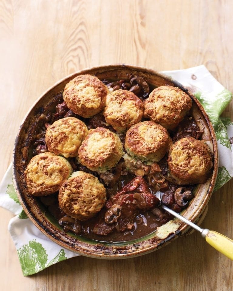 Braised beef in ale with mustard scone topping