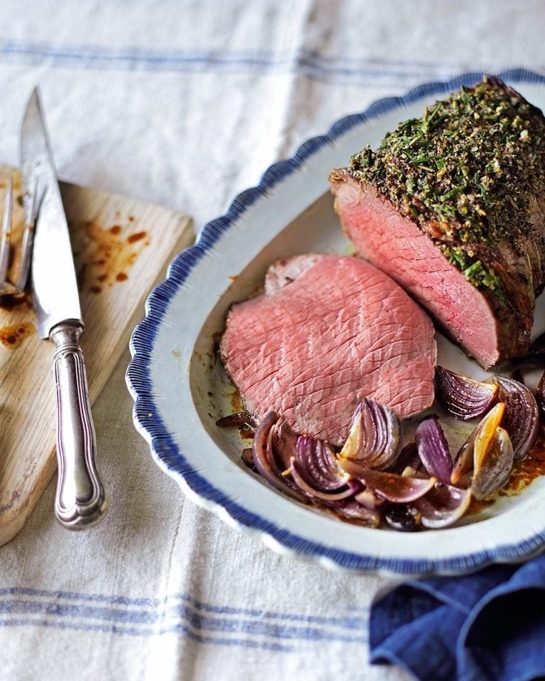 Slow-roast beef with a pepper and rosemary crust and onions