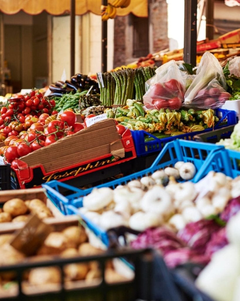 Image of market stall in Venice laden with fruit and veg