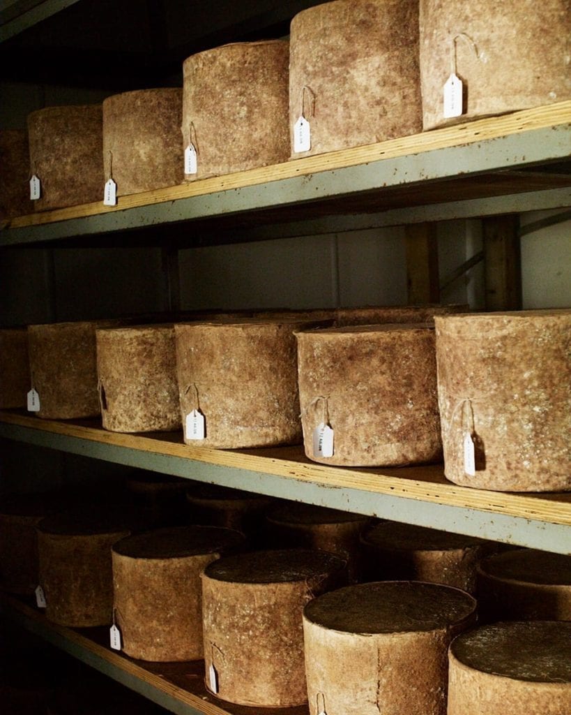 Image of wheels of cheese