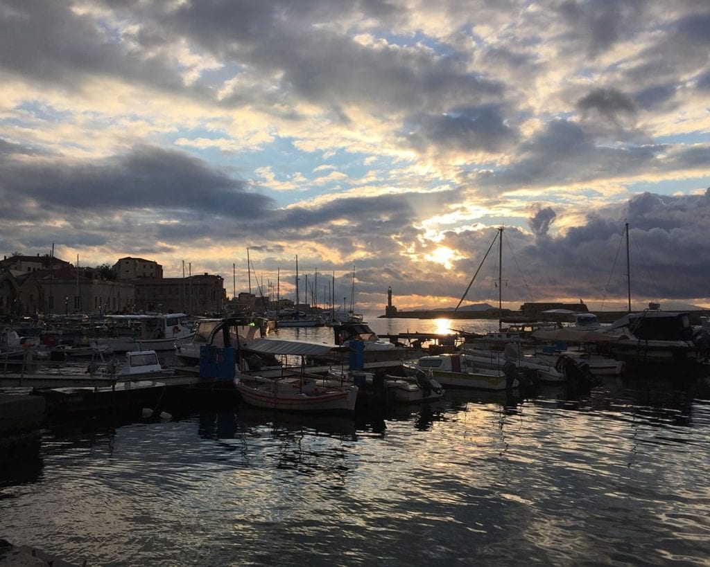 Image of Crete's port at dusk