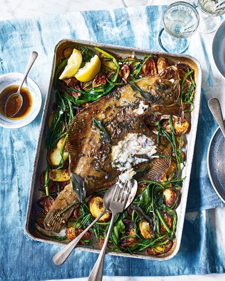 Whole roast plaice with anchovy and sage butter, new potatoes and sea vegetables