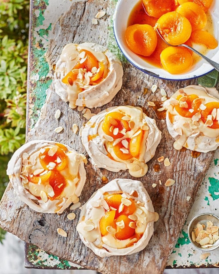 Almond pavlovas with amaretto custard, apricots and caramel sauce