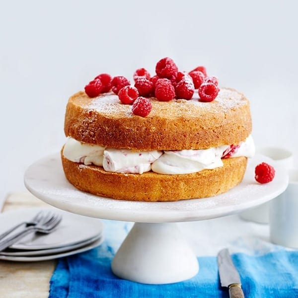 Image of sponge cake with raspberries and cream