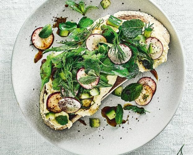 Houmous and herbs on toast