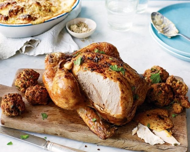 Roast chicken with buttery stuffing balls